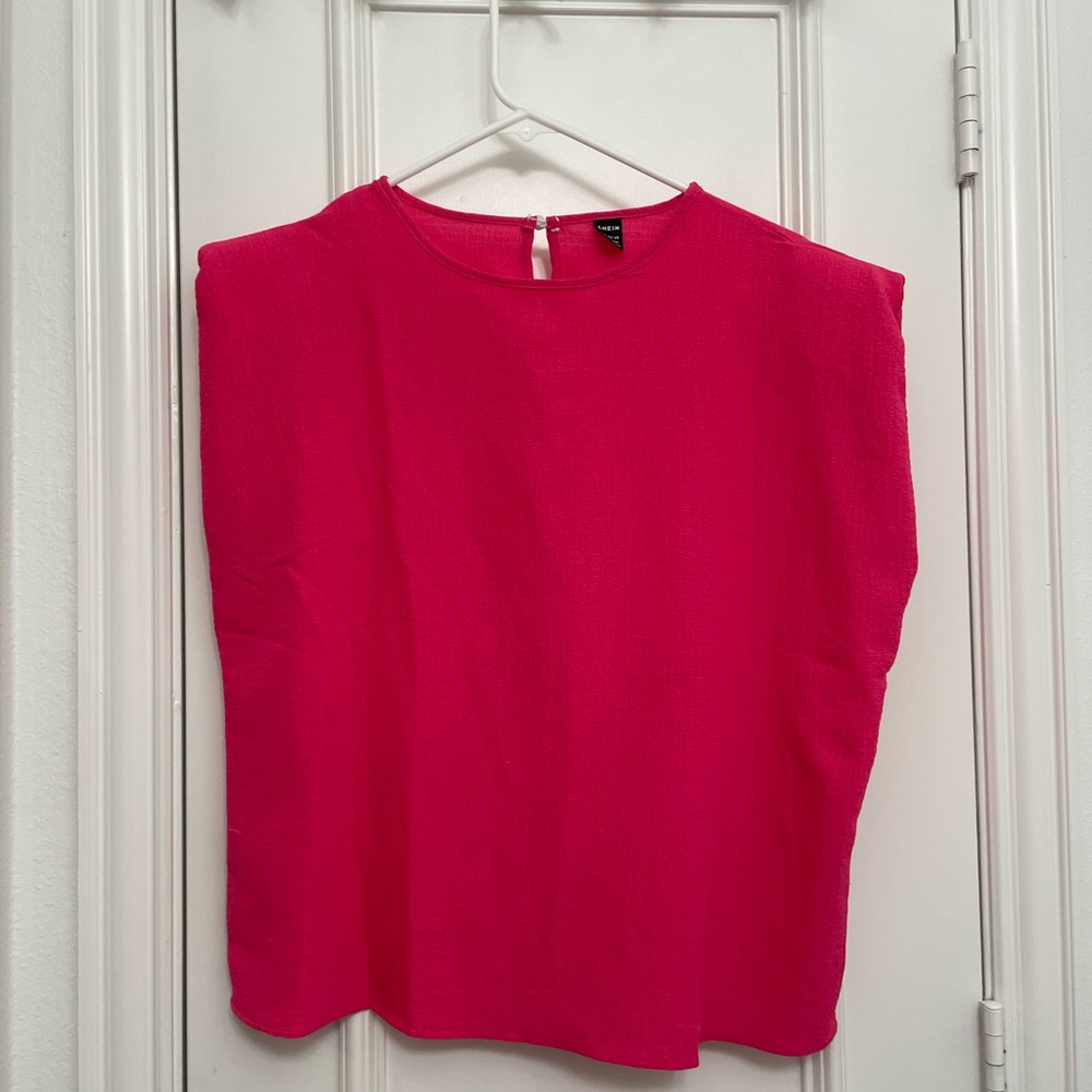 Hot pink top with shoulder pads